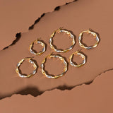 15 mm Two Tone Twisted Earrings in 14K Gold