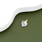 An image showing one 9ct gold Heart crystal pendant placed on a green and white background.