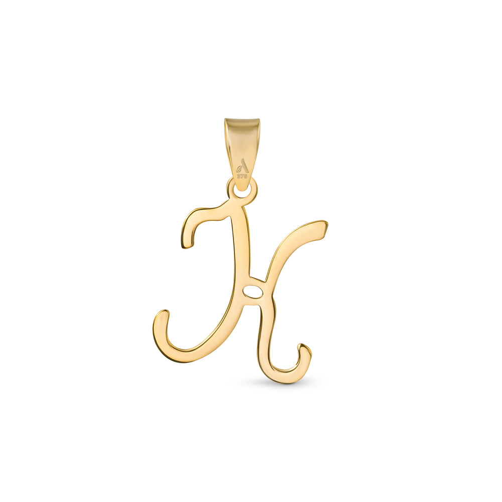 A gold pendant shaped like the letter "K" designed with elegant curves and a flowing script style with a small loop at the top for attaching to a chain.