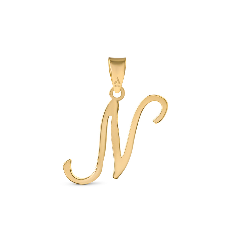 A gold pendant shaped like the letter "N" designed with elegant curves and a flowing script style with a small loop at the top for attaching to a chain.