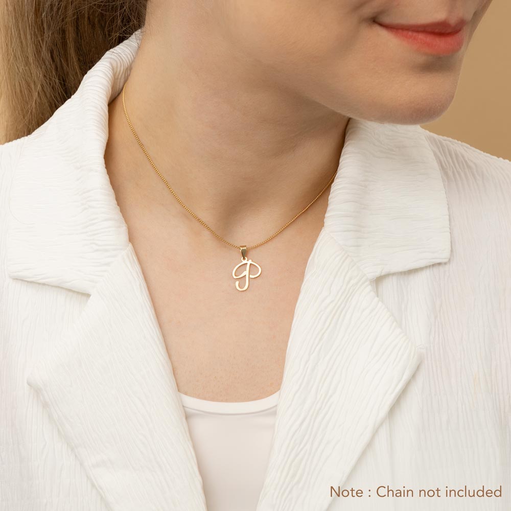 A woman wearing a gold necklace with an alphabet pendant in the shape of the letter 'P'. The text in the corner notes, "Note: Chain not included.