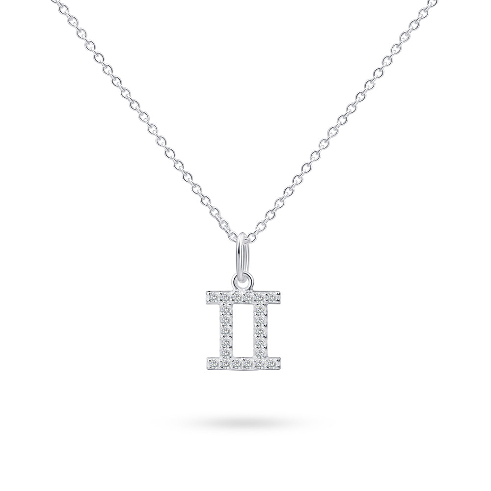Product image of sterling silver necklace with gemini zodiac pendant with stones against white background.