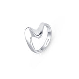 Women's Silver Wave ring placed on a white surface.