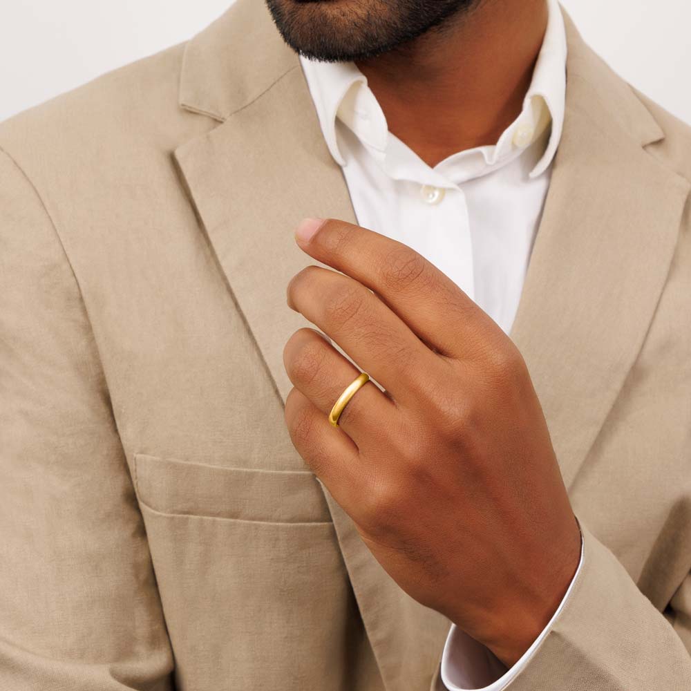 Men wearing gold plated wedding band in 4mm thick.