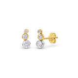 Two elegant yellow and white gold crawler earrings featuring cubic zirconia against a white background