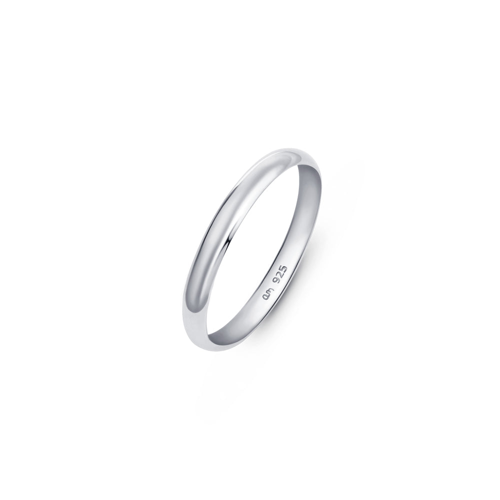 Sleek wedding ring 2.5mm in width made of 925 silver placed on a clean white backdrop